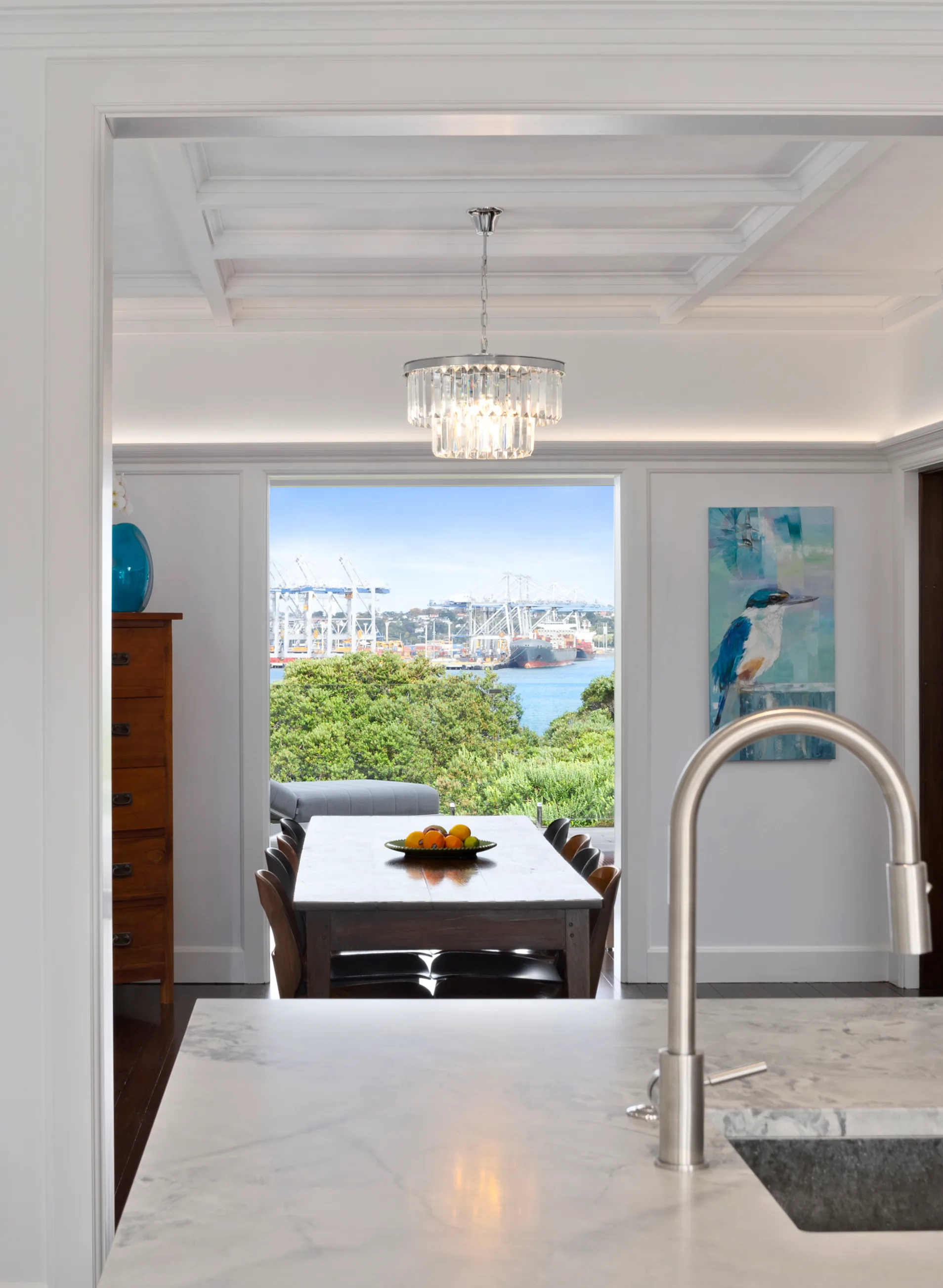 Stanley Point – kitchen looking through to the dining room with harbour view beyond